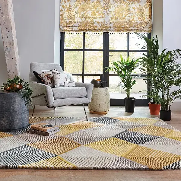 Multi-colored nylon area rug with a geometric, textured pattern.