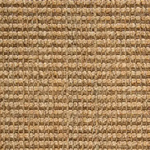 light brown sisal carpet with a natural woven texture in a rectangular pattern.