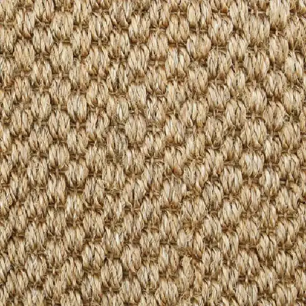 natural light brown sisal carpet with a distinct woven texture in a diamond pattern.