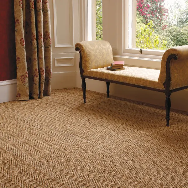 beige sisal carpet with a herringbone pattern in a room