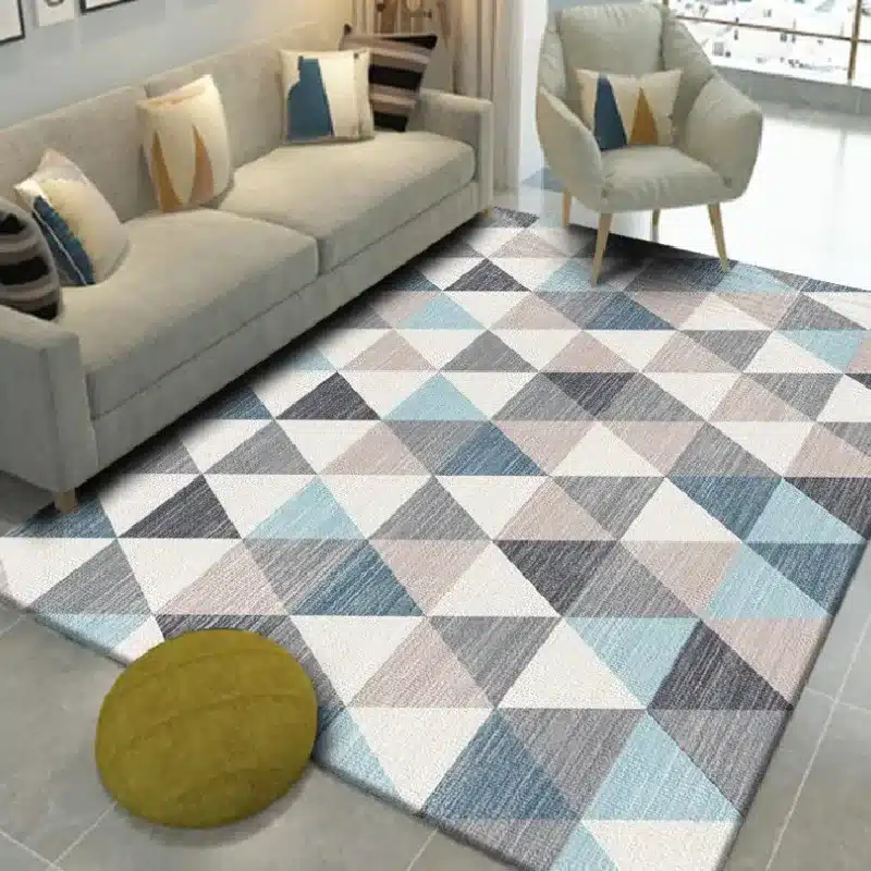 geometric patterned area rug with stitched carpet borders